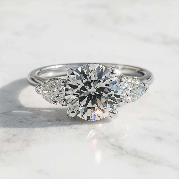 Round and Pear Shape Three Stone | Engagement Ring Dallas