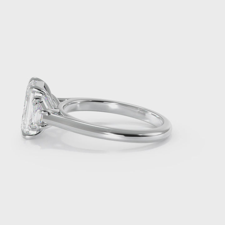 Emerald and Trapezoid Three Stone Diamond Ring | Dallas