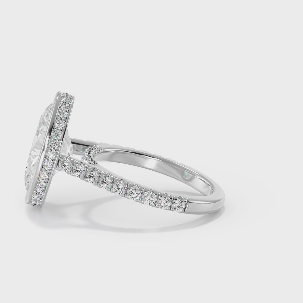 Bezel Set Oval Diamond Engagement Ring with Diamond Band