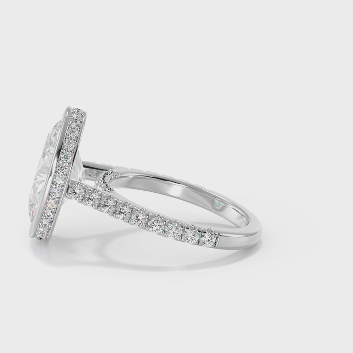 Bezel Set Oval Diamond Engagement Ring with Diamond Band