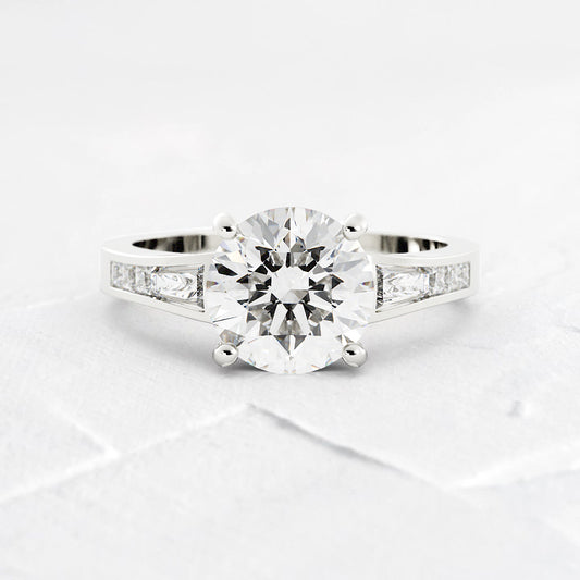 Jennifer Round and Baguette Cut Diamond Engagement Ring
