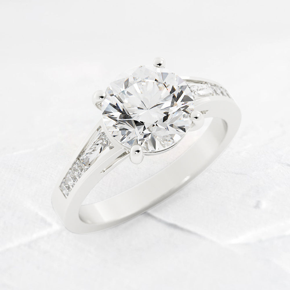 Jennifer Round and Baguette Cut Diamond Engagement Ring