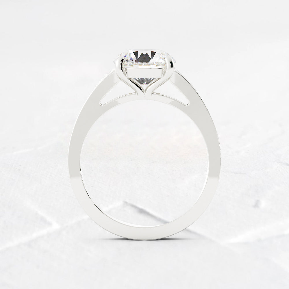 Jennifer Round and Baguette Cut Diamond Engagement Ring
