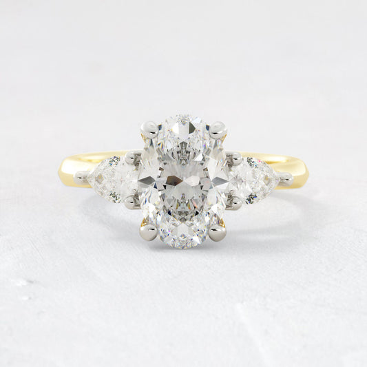 Dhalia Three Stone Oval and Pear Shapes Diamond Engagement Ring